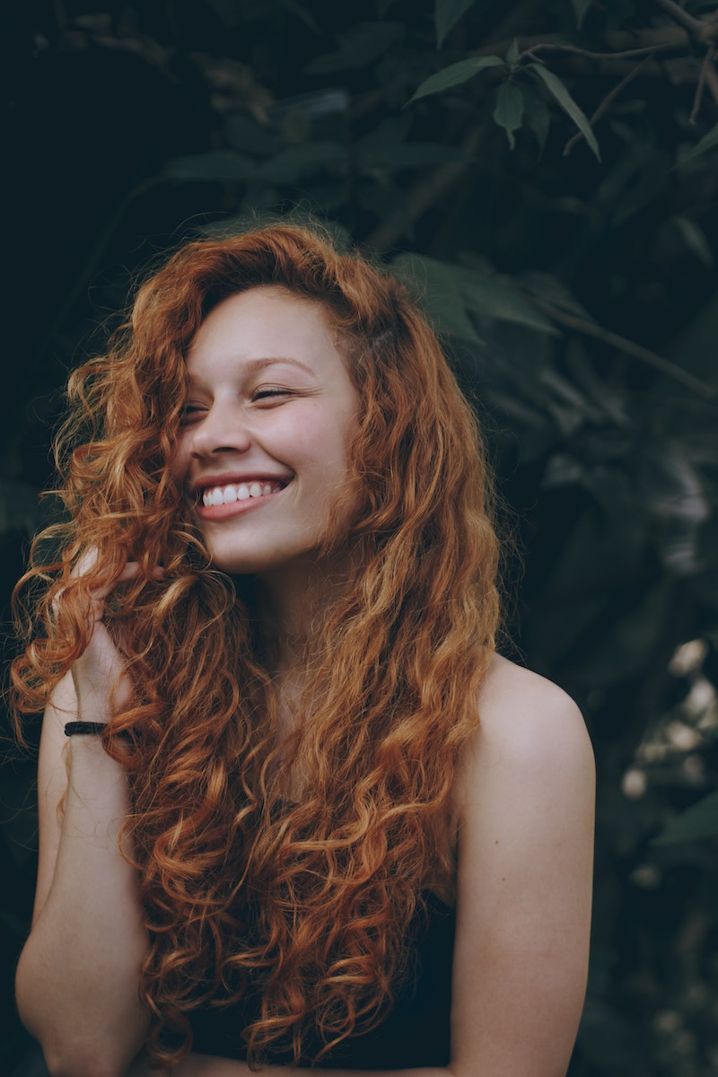 Smiling Woman With Red Hair